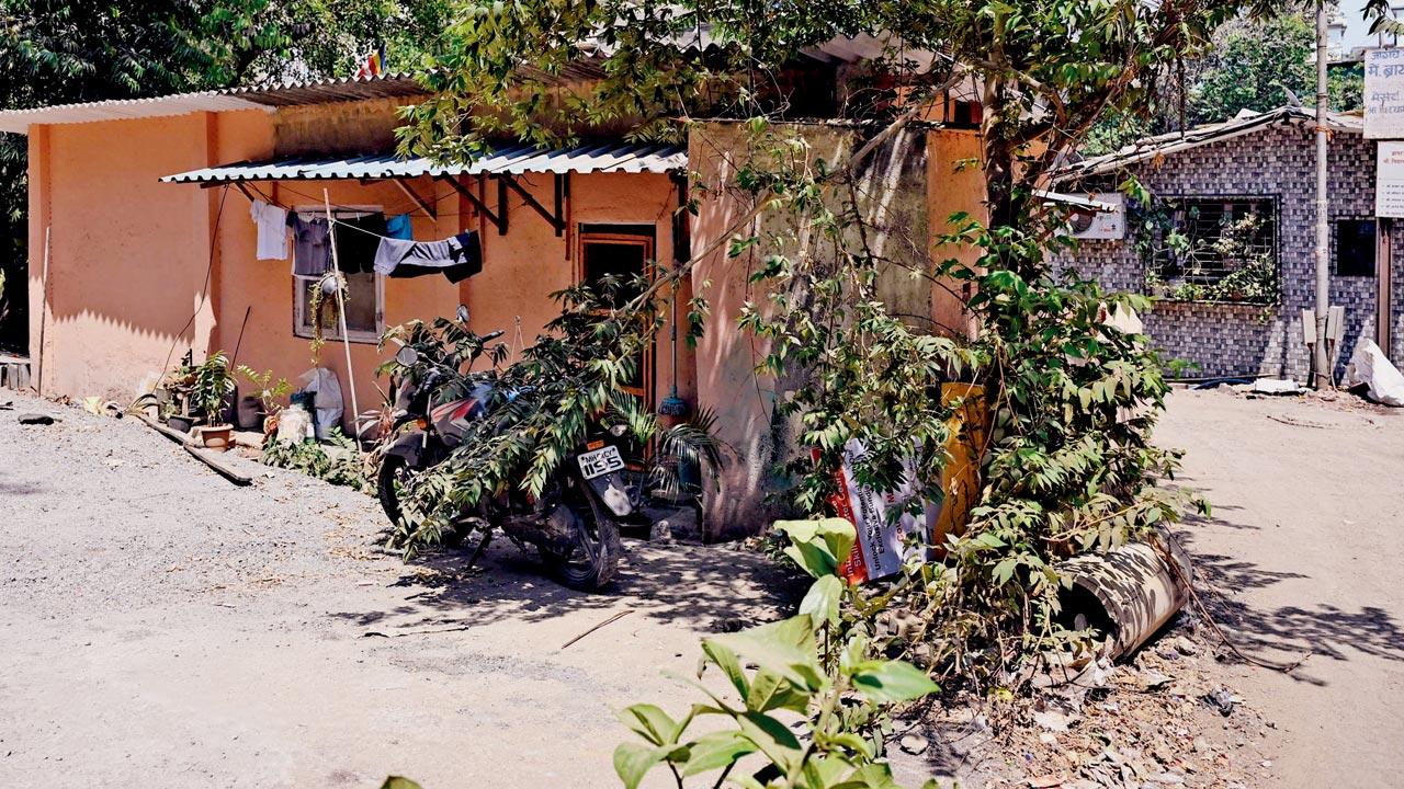 The road widening work that is being carried out at Manipada Road which leads to the house