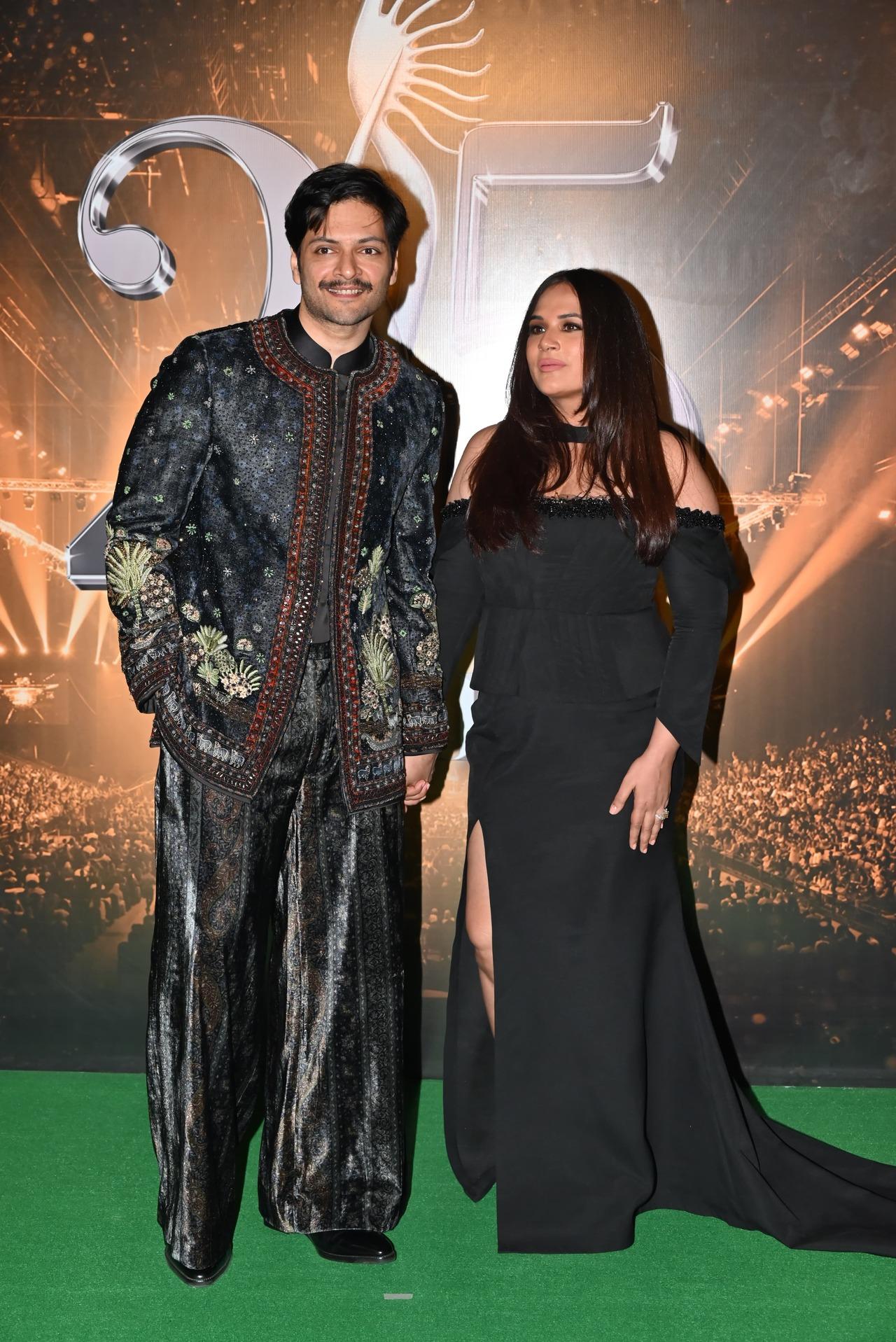 Doting parents Richa Chadha and Ali Fazal twinned in black for the event.