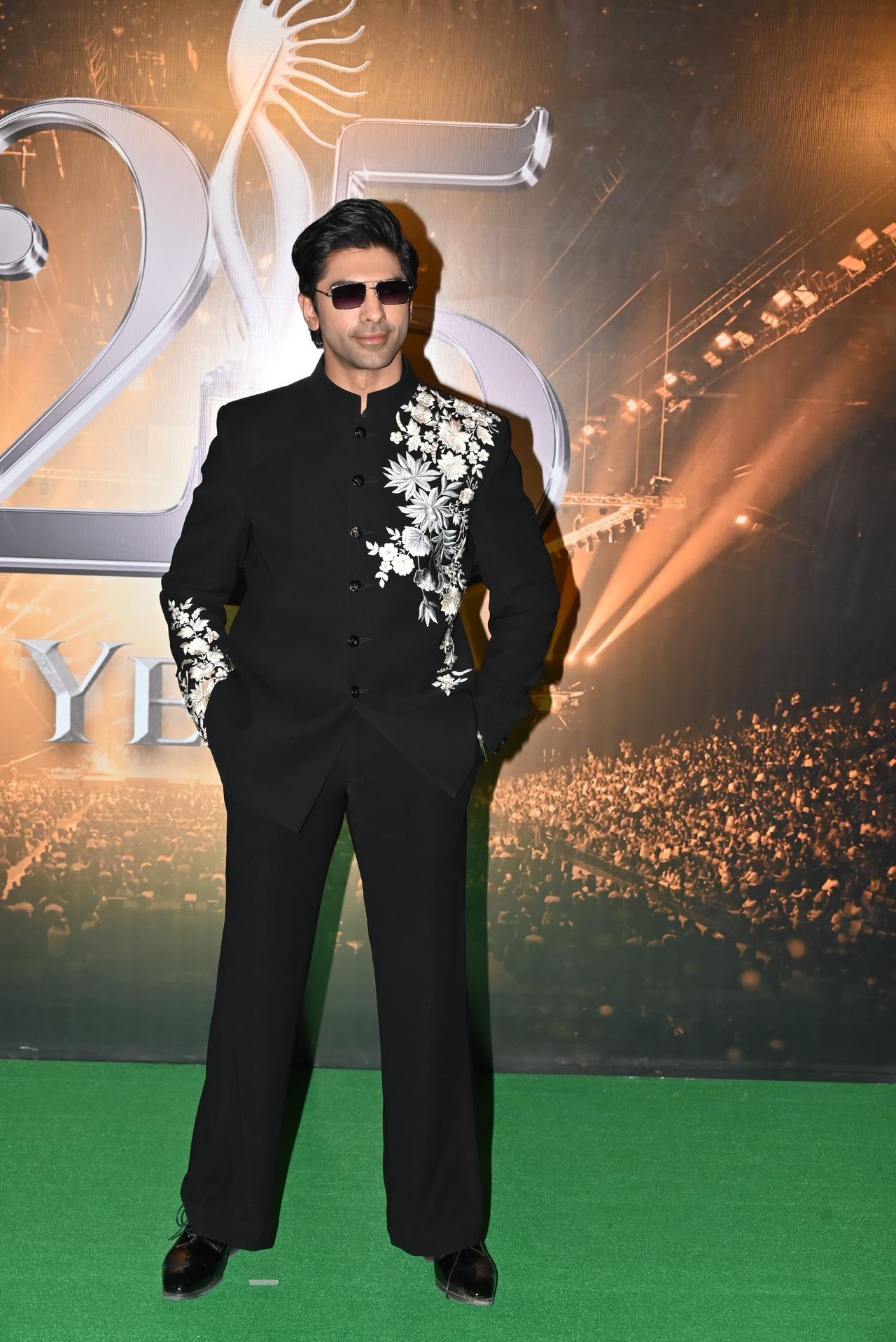Heeramandi star Taha Shah Badussha kept it simple yet classy in a black ensemble with white floral detailing.