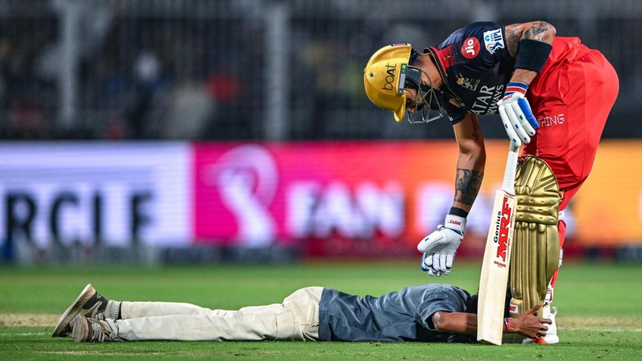 Viral video: New footage shows fan evading security to meet Kohli in IPL opener