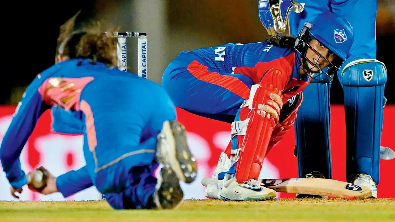 MI’s Amelia Kerr (left) takes a catch to dismiss DC’s Jemimah Rodrigues at Brabourne Stadium on Saturday. Pic/AFP