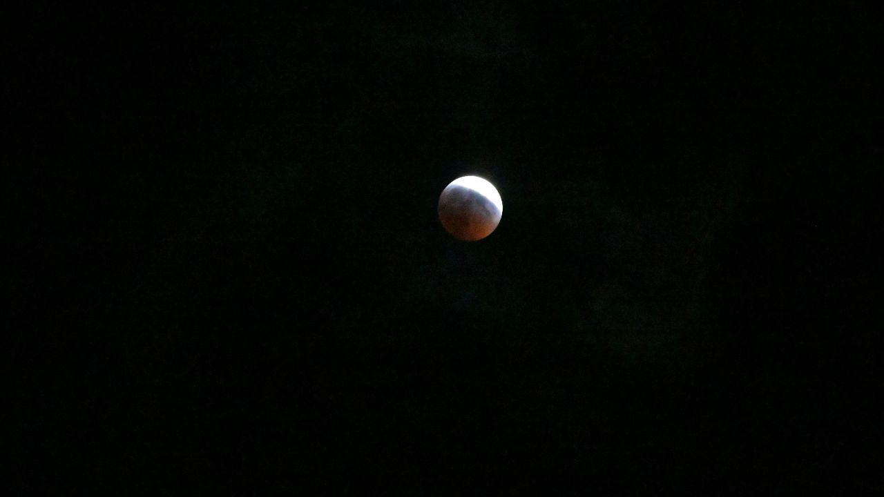 A partial lunar eclipse is seen during the Blood Moon Lunar Eclipse in Tegucigalpa, Honduras, where the moon was partially immersed in Earth's shadow, showcasing the full brilliance of the Blood Moon phenomenon