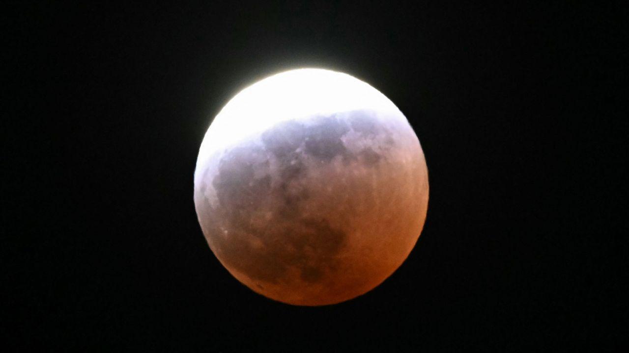 A partial lunar eclipse is seen during the Blood Moon Lunar Eclipse above Palm Springs, California