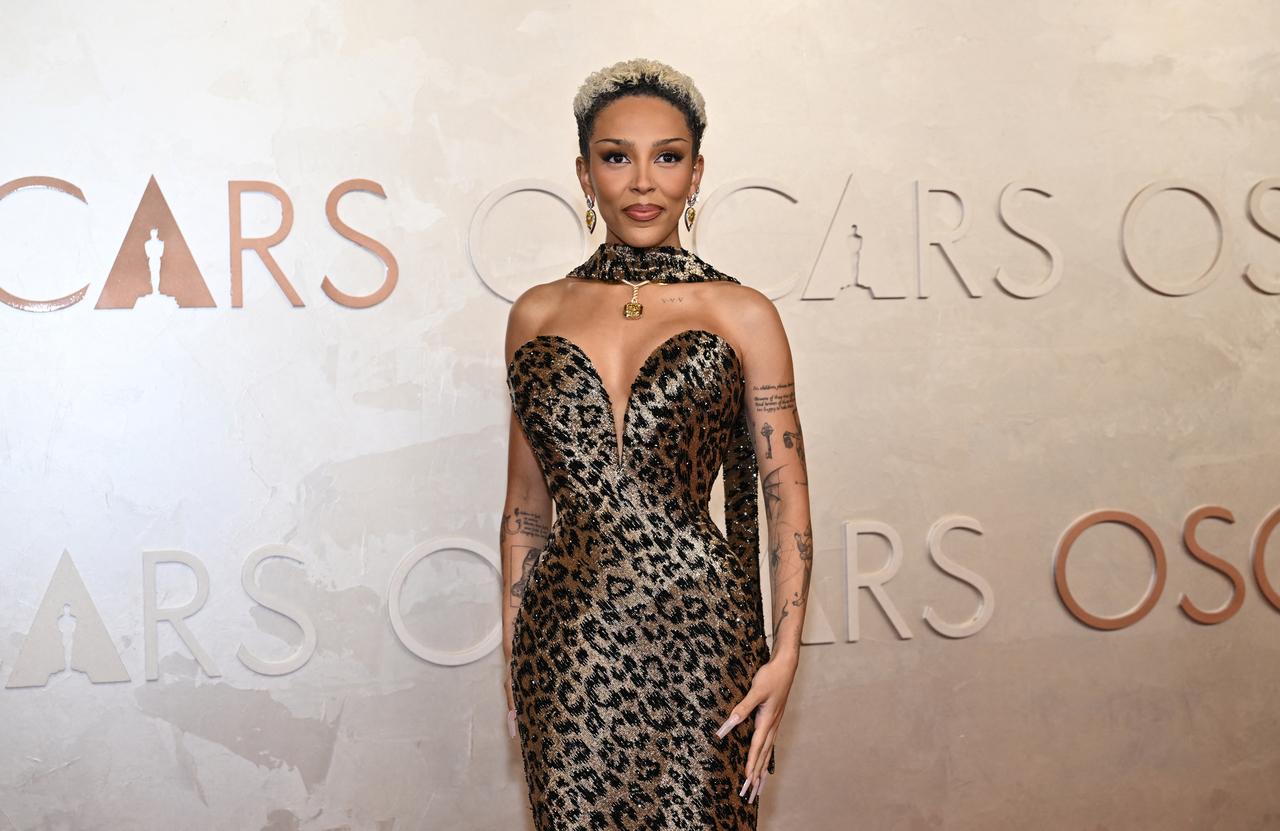 Doja Cat opted for a namesake couture option as she sported a leopard-print corset dress covered in hand-sewn sequins by Olivier Rousteing.