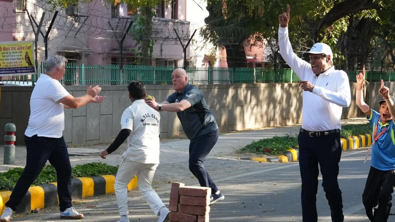 The images captured a joyous moment as political and sporting figures bonded over the game that unites both nations