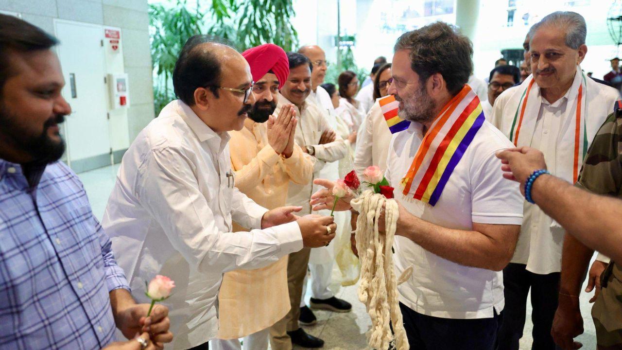 Rahul Gandhi was greeted at the Mumbai airport by the members of Congress party in Maharashtra