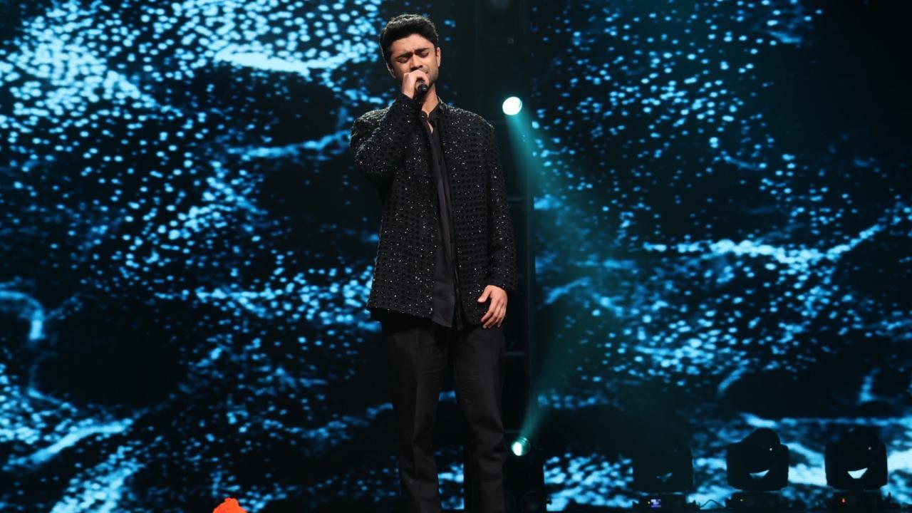 Taaruk Raina sings on the Indian Idol stage while promoting The Wake of Nation