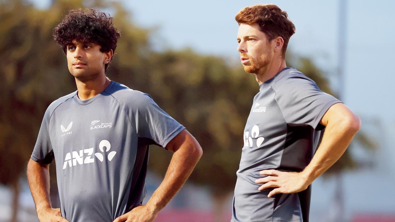 New Zealand’s Rachin Ravindra (left) and skipper Mitchell Santner during a training session at the ICC Academy in Dubai on Saturday. Pic/Getty Images