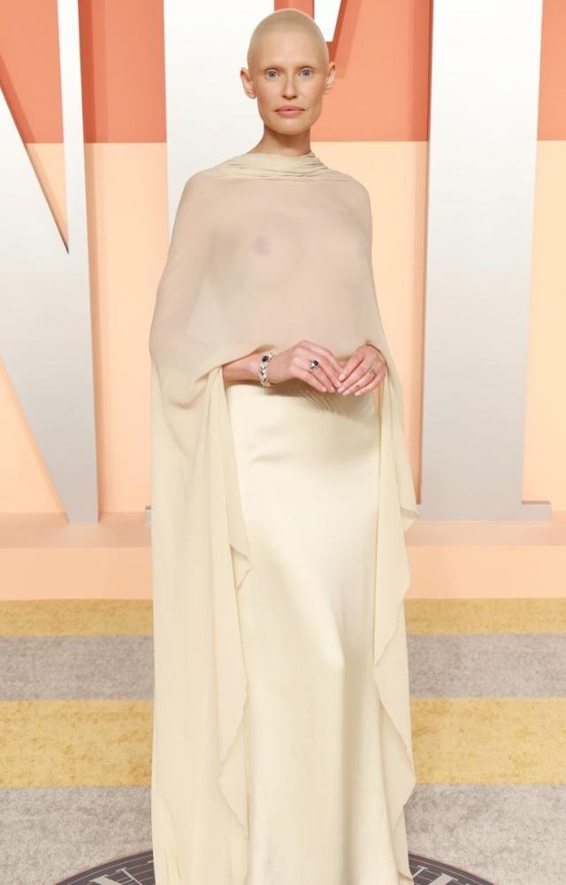 Bianca Balti turned heads in a Fendi couture SS23 featuring a glamorous sheer top with floral long-length sleeves