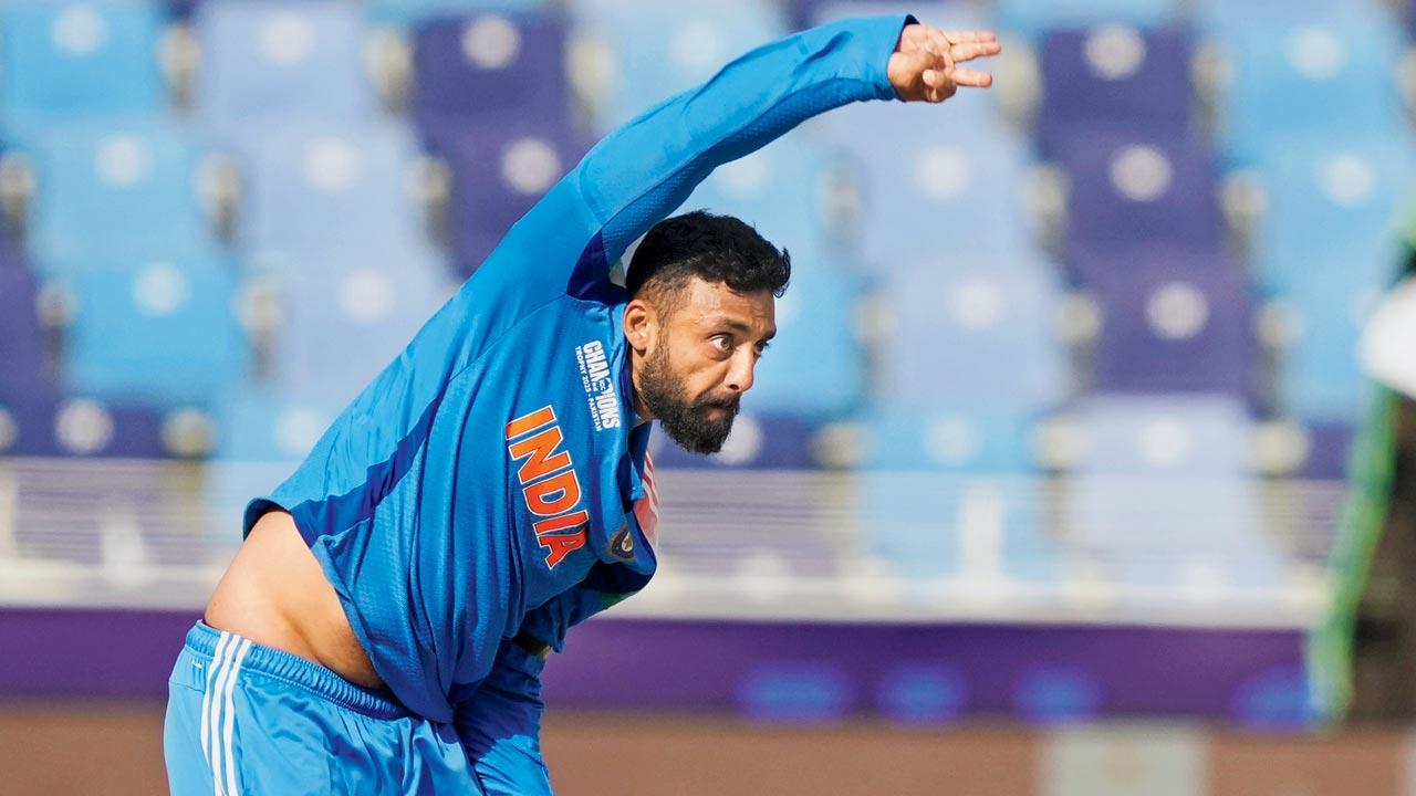 India’s Varun Chakravarthy during the Champions Trophy semi-final against Australia in Dubai yesterday. Pic/PTI