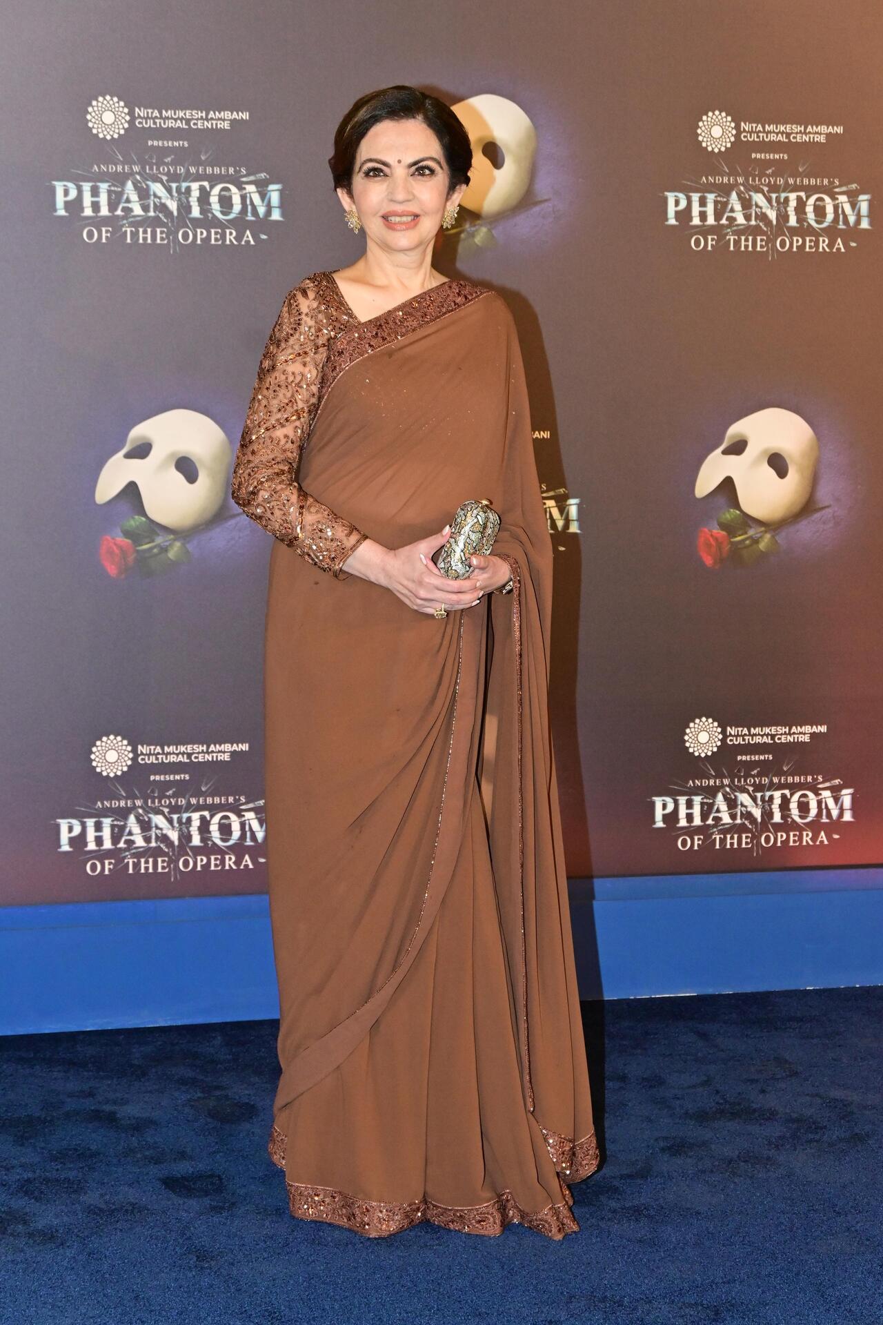 Nita Ambani exuded elegance in a brown saree as she attended the opening night of Phantom of the Opera.