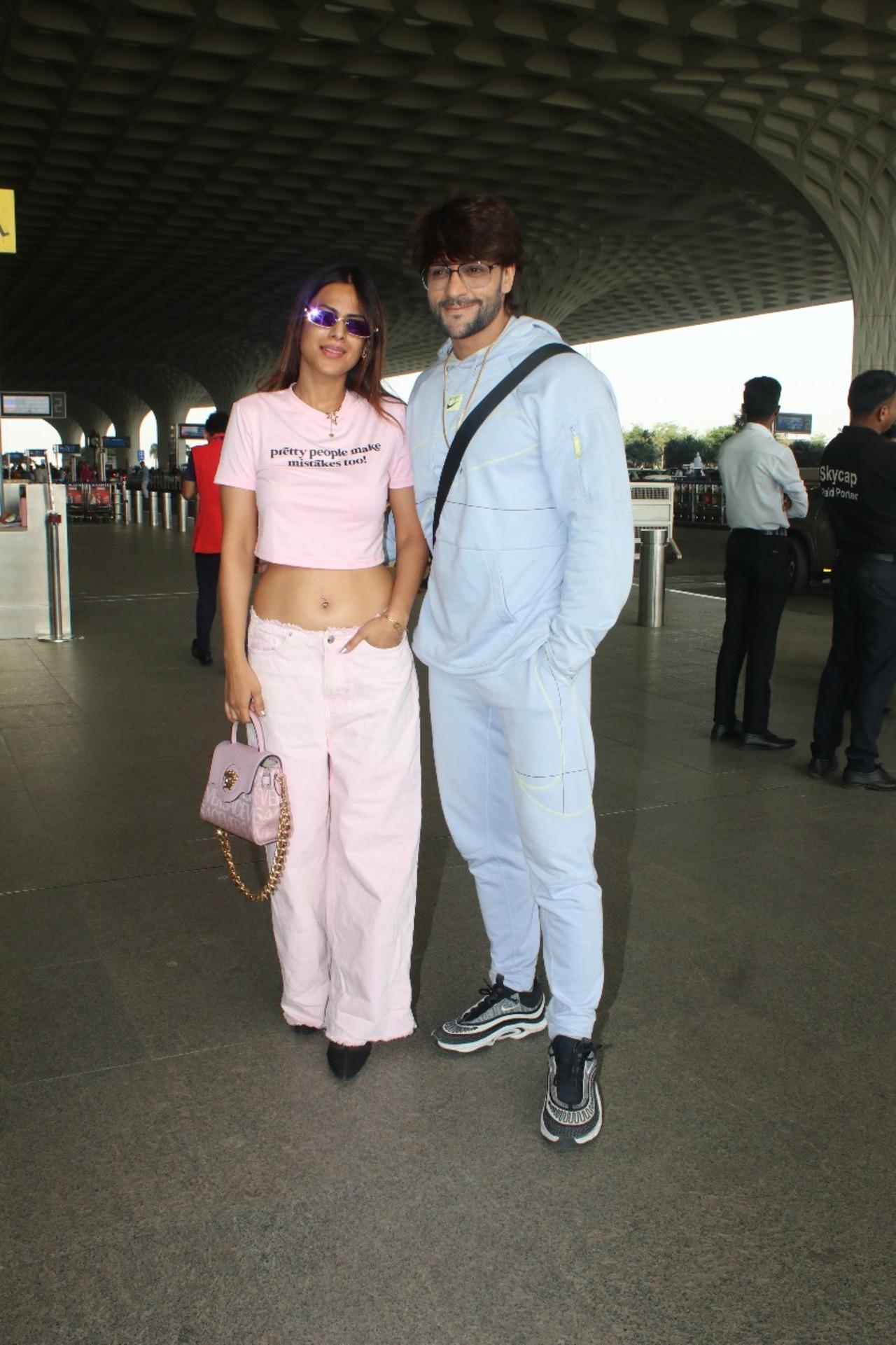 Nia Sharma exuded Barbie vibes as she posed with Shalin Bhanot at the airport. 
