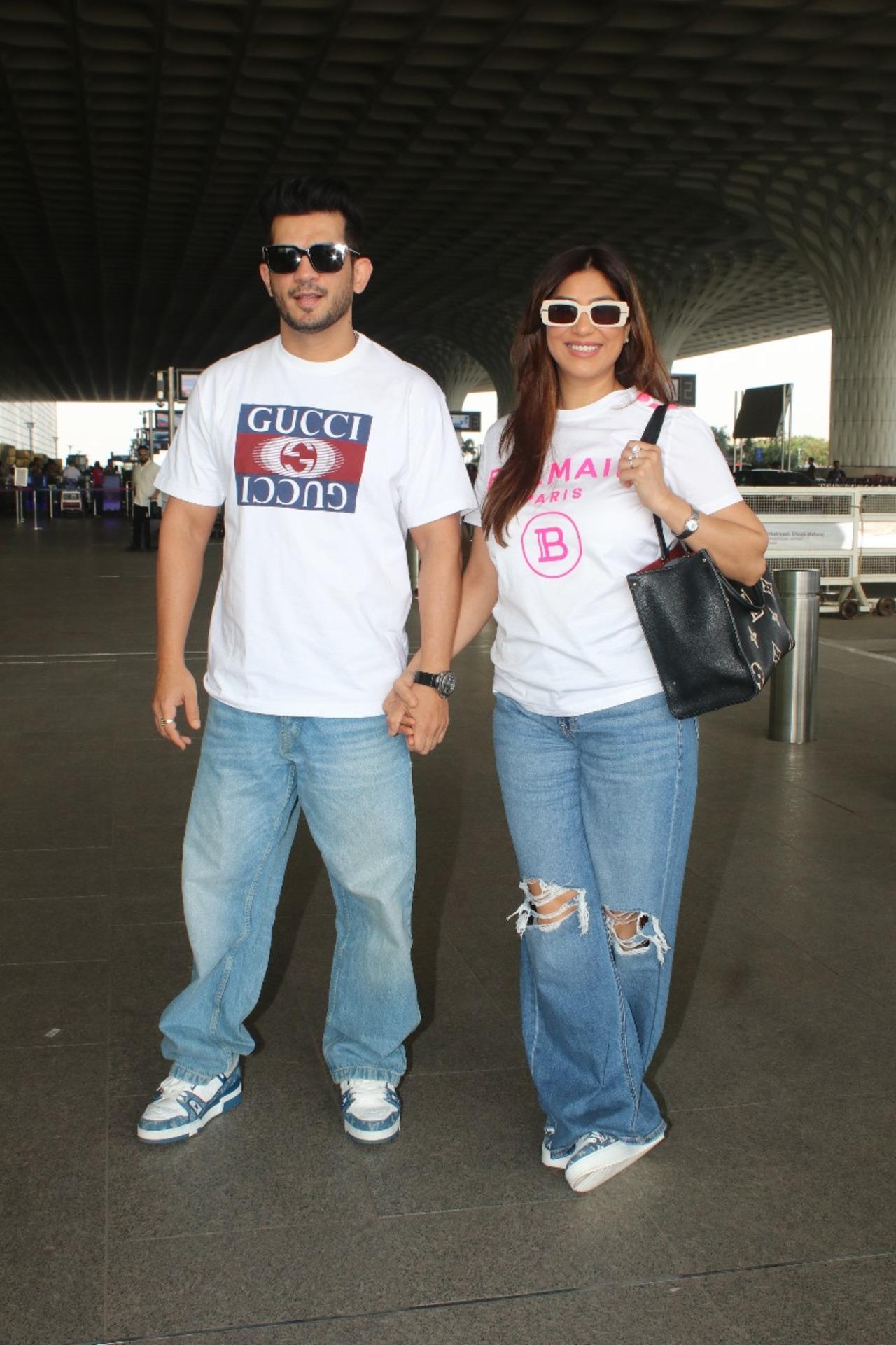 Arjun Bijlani was spotted with his wife at the airport. They twinned in white outfits. 