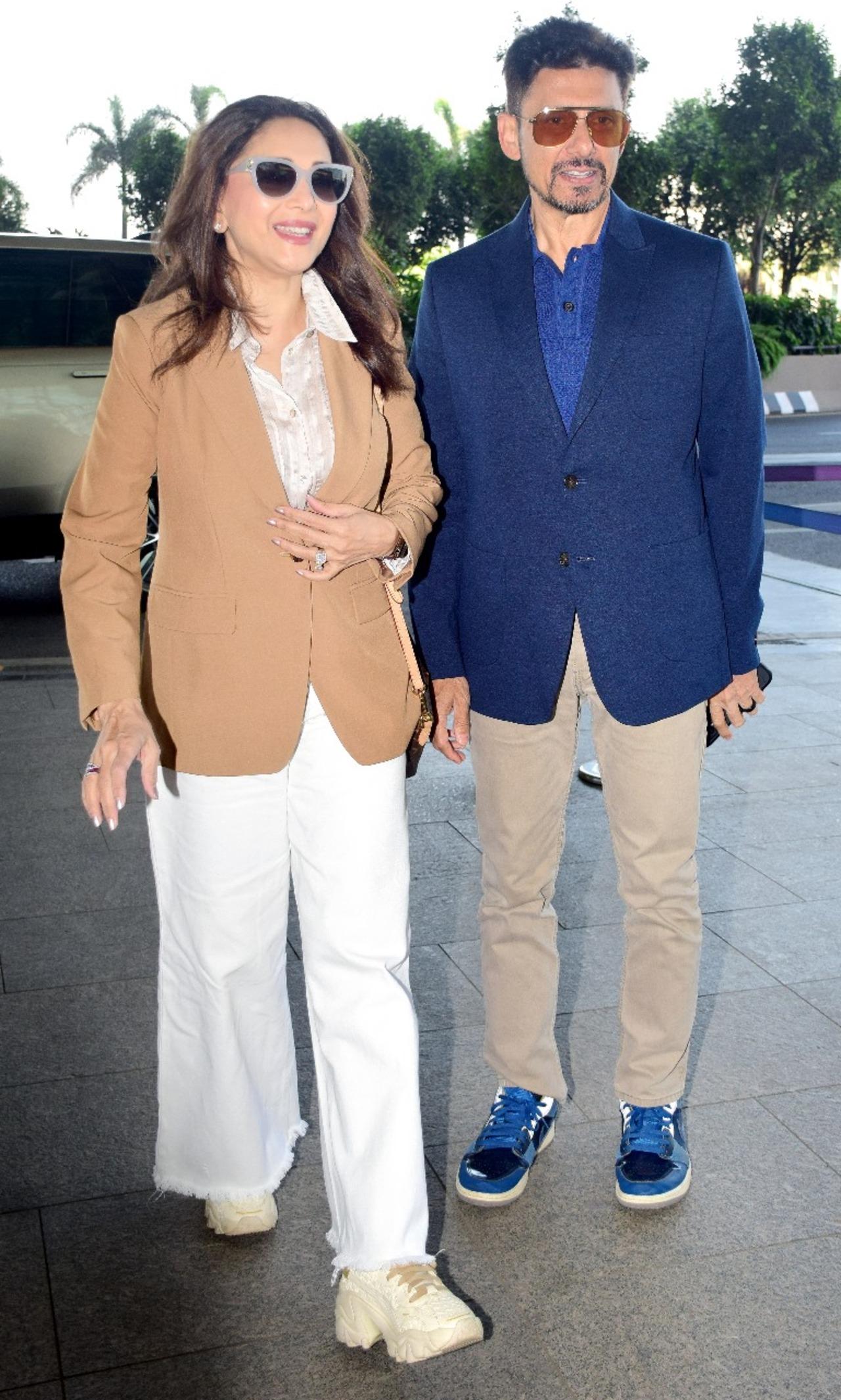 Madhuri Dixit and her husband Shriram Nene were spotted at the airport.
