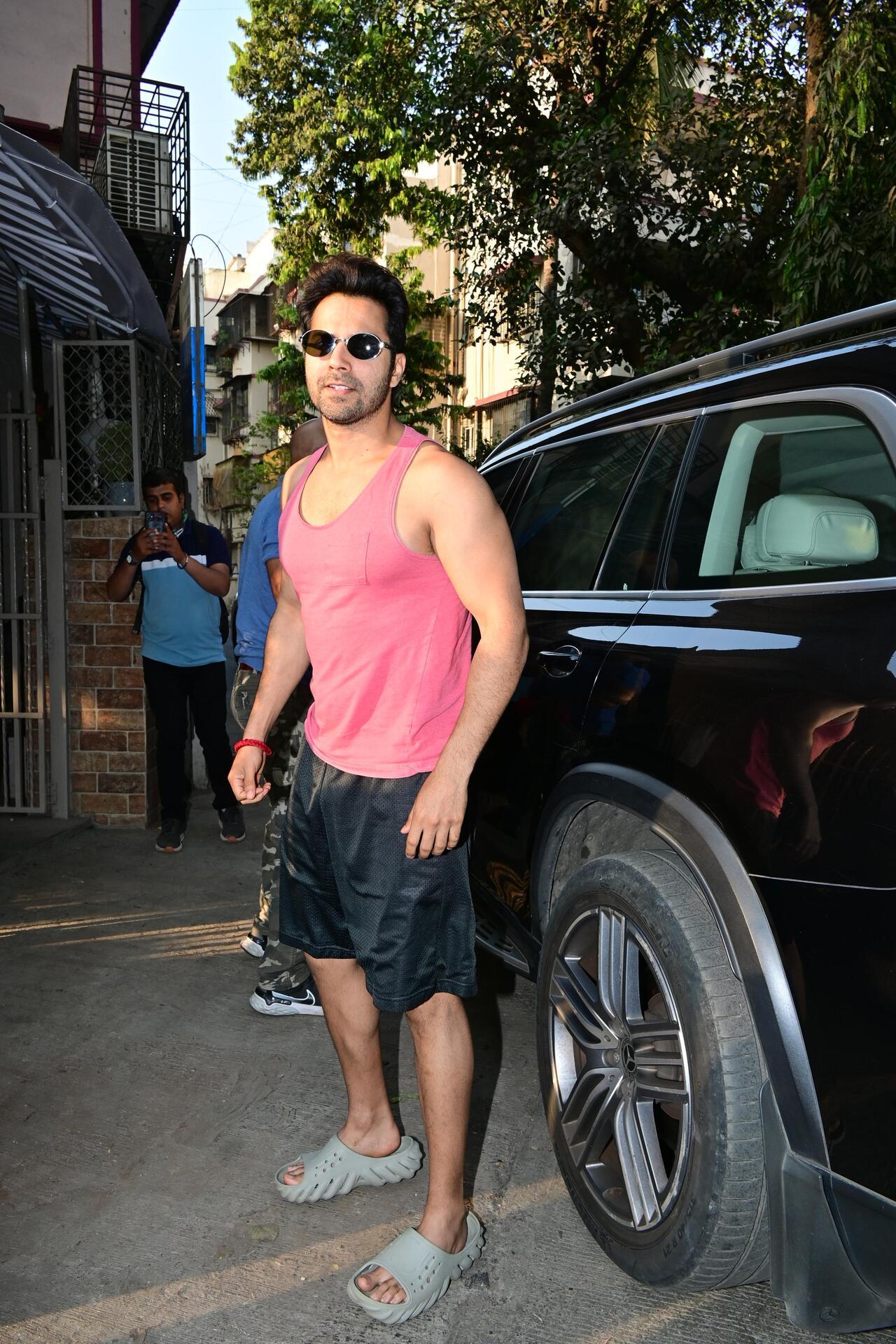 Varun Dhawan was seen being the comfy himself in a red vest and black shorts 
