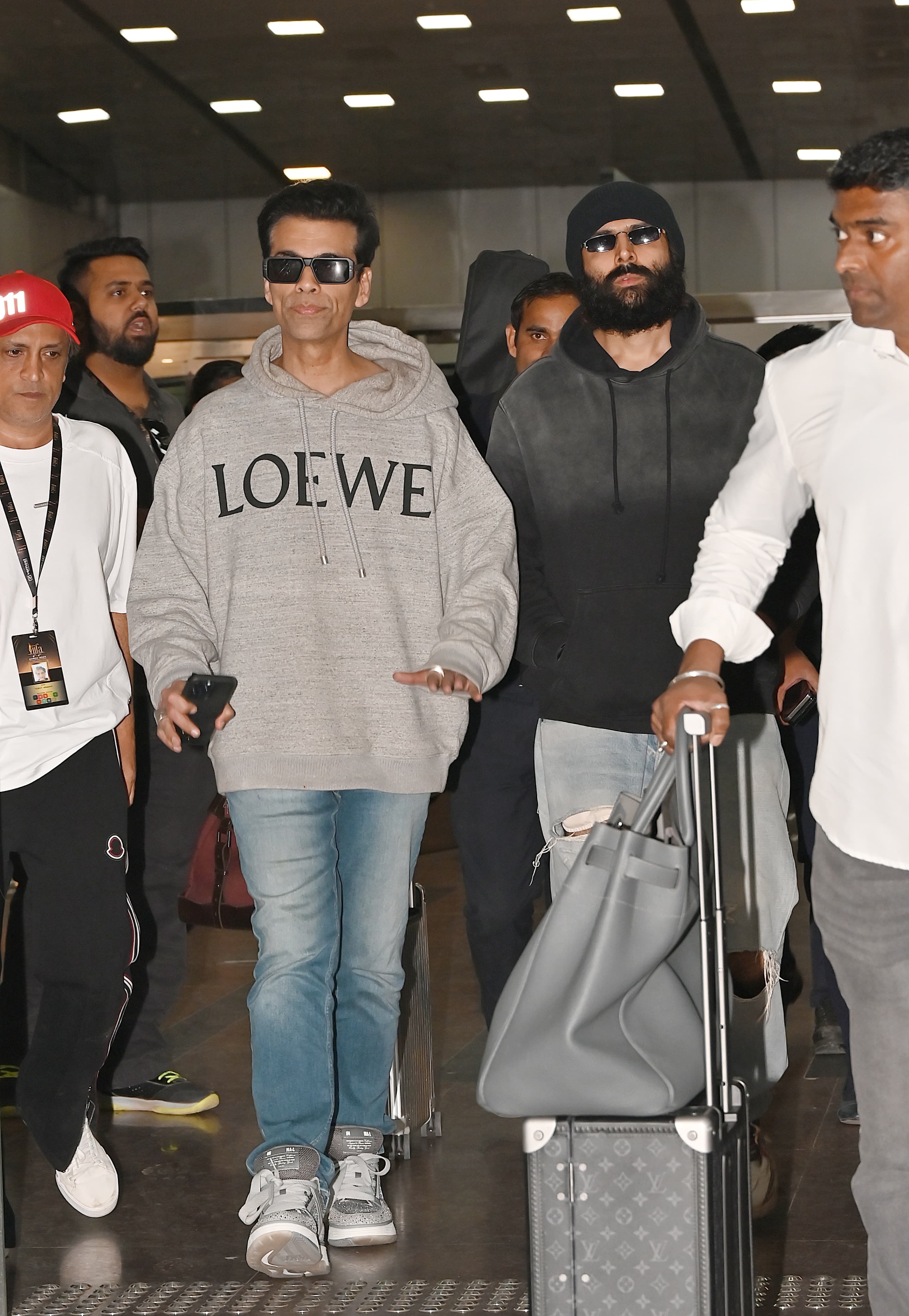 Kartik Aaryan was accompanied by Karan Johar. The duo reached the Pink City together as they geared up to attend the grand event.