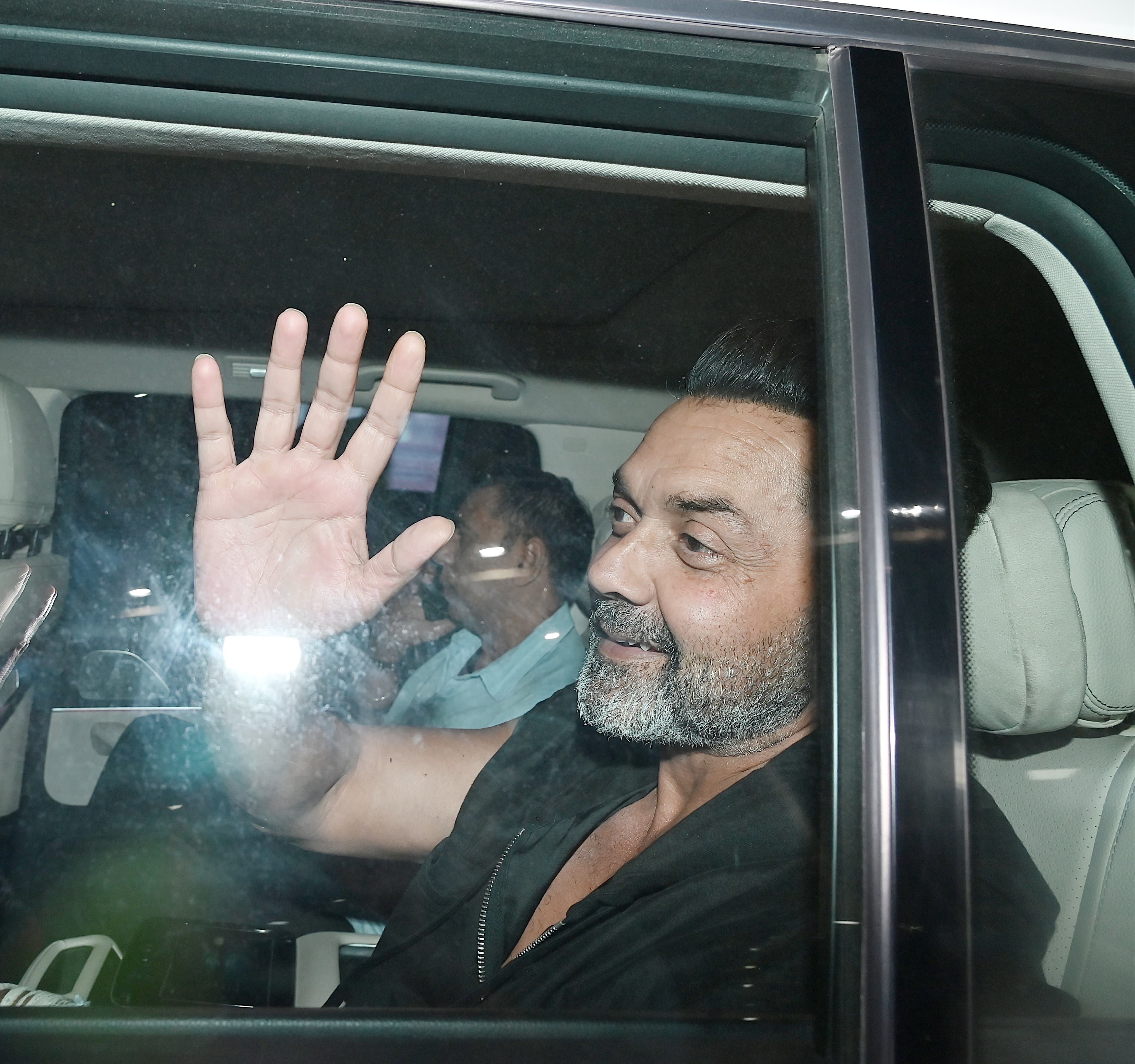 Bobby Deol was snapped in his car as he reached Jaipur for IIFA 2025.