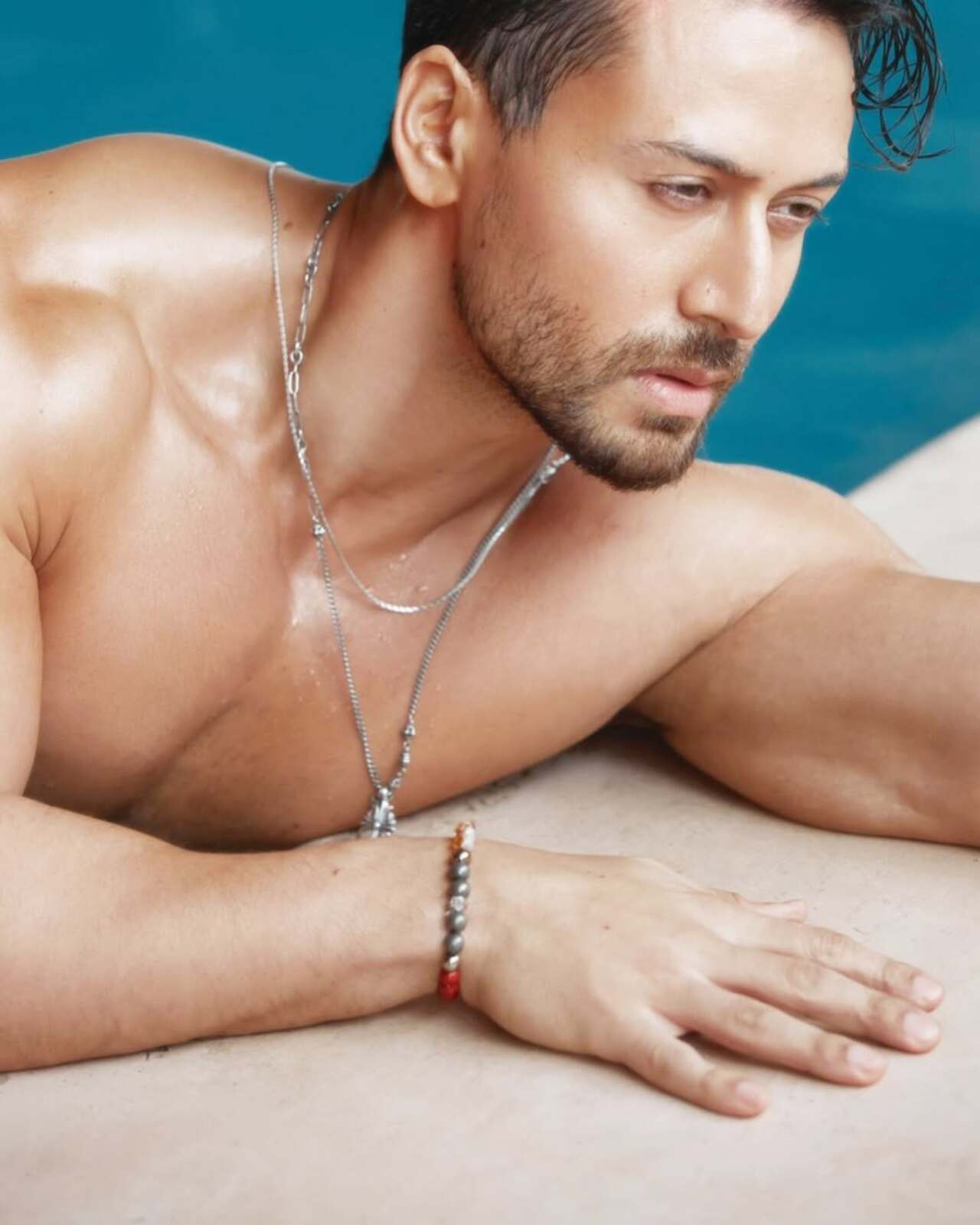 The actor, who is the son of Jackie Shroff and Ayesha Shroff has garnered a fanbase, courtesy of his charming looks and chiselled physique. Check out his shirtless pictures. 