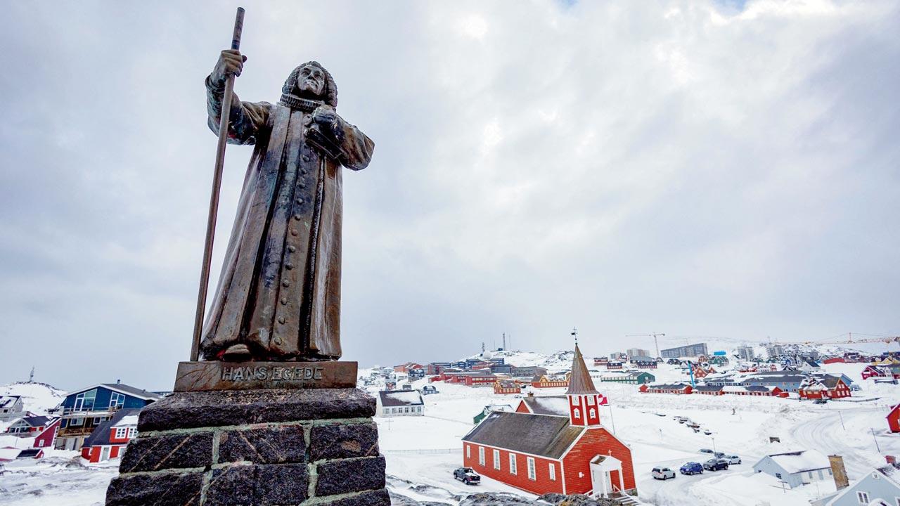 A statue of Dano-Norwegian Lutheran missionary Hans Egede is pictured near the Cathedral in Greenland’s capital city Nuuk. Pic/AFP