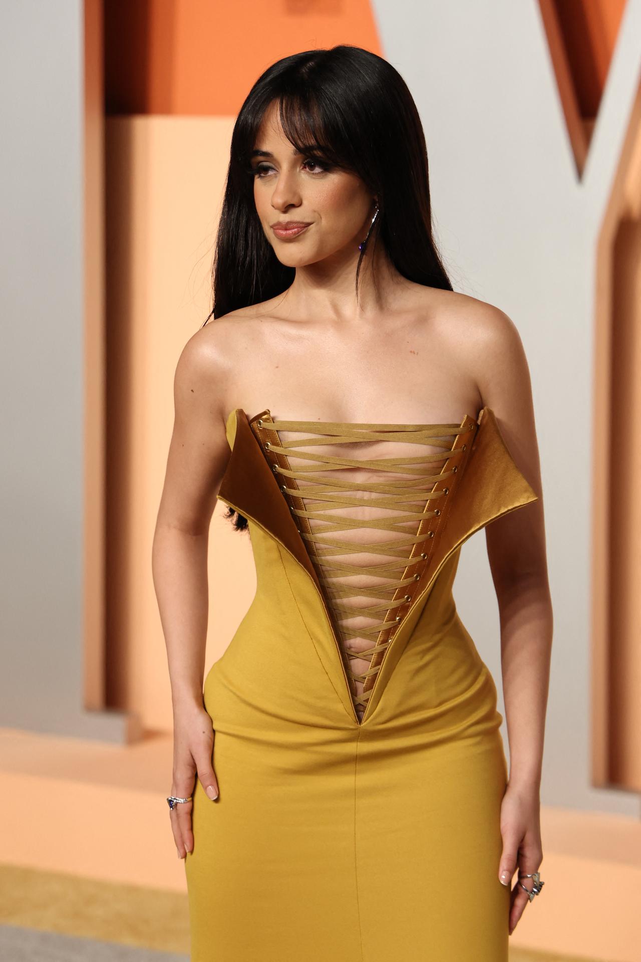 Camila Cabello turned heads in a risque outfit with a plunging neckline.