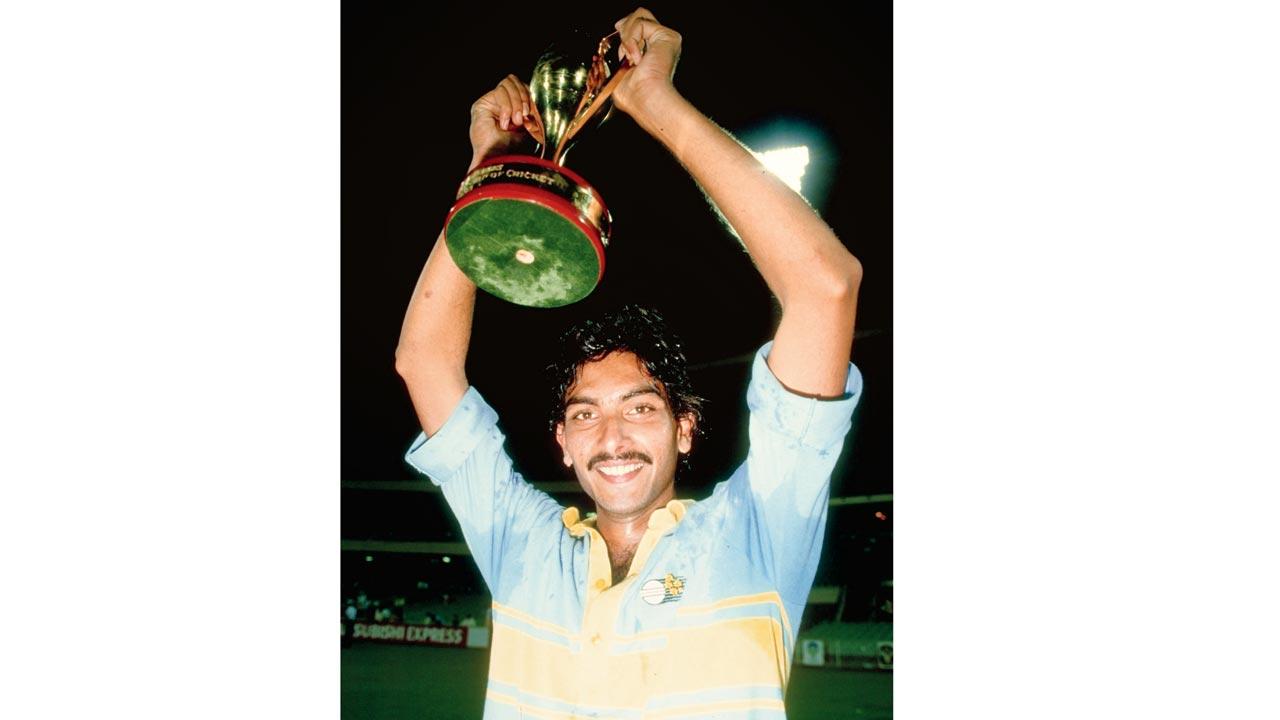 Champion of champions Ravi Shastri holds up the Cup