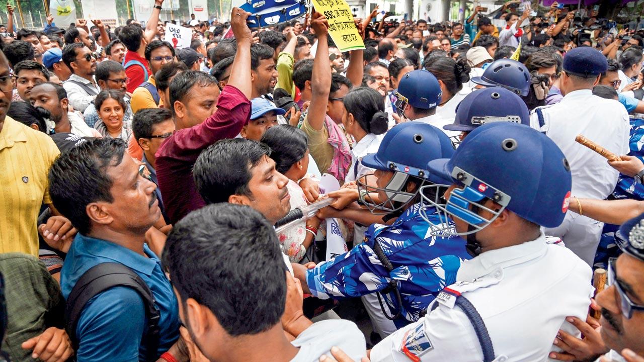 Protesting teachers surround education minister’s office in West Bengal