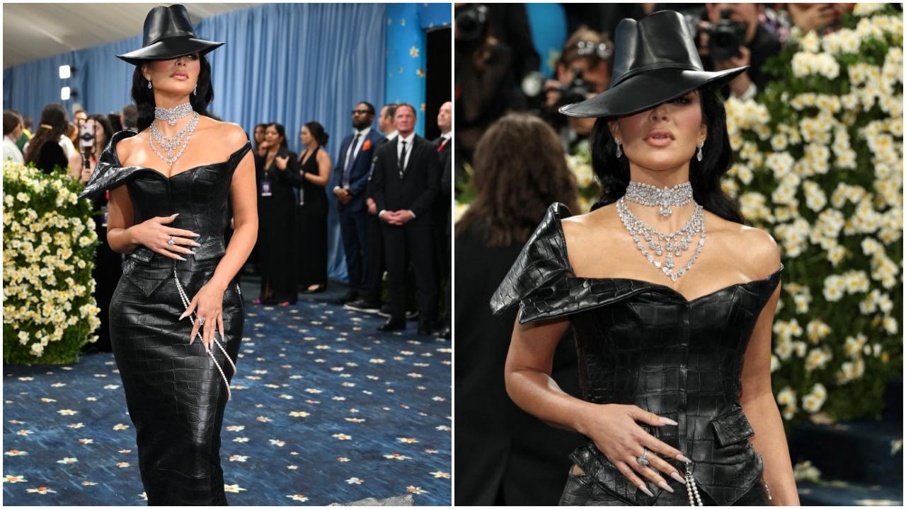 Kim Kardashian
Kim Kardashian opted for a black leather ensemble by Chrome Hearts featuring an alligator skin-inspired texture. She accessorised the look with a black hat which covered one eye, and a statement diamond neckpiece. For someone whose outfits at the Met Gala have always been the talk of the town, this one didn’t stand out