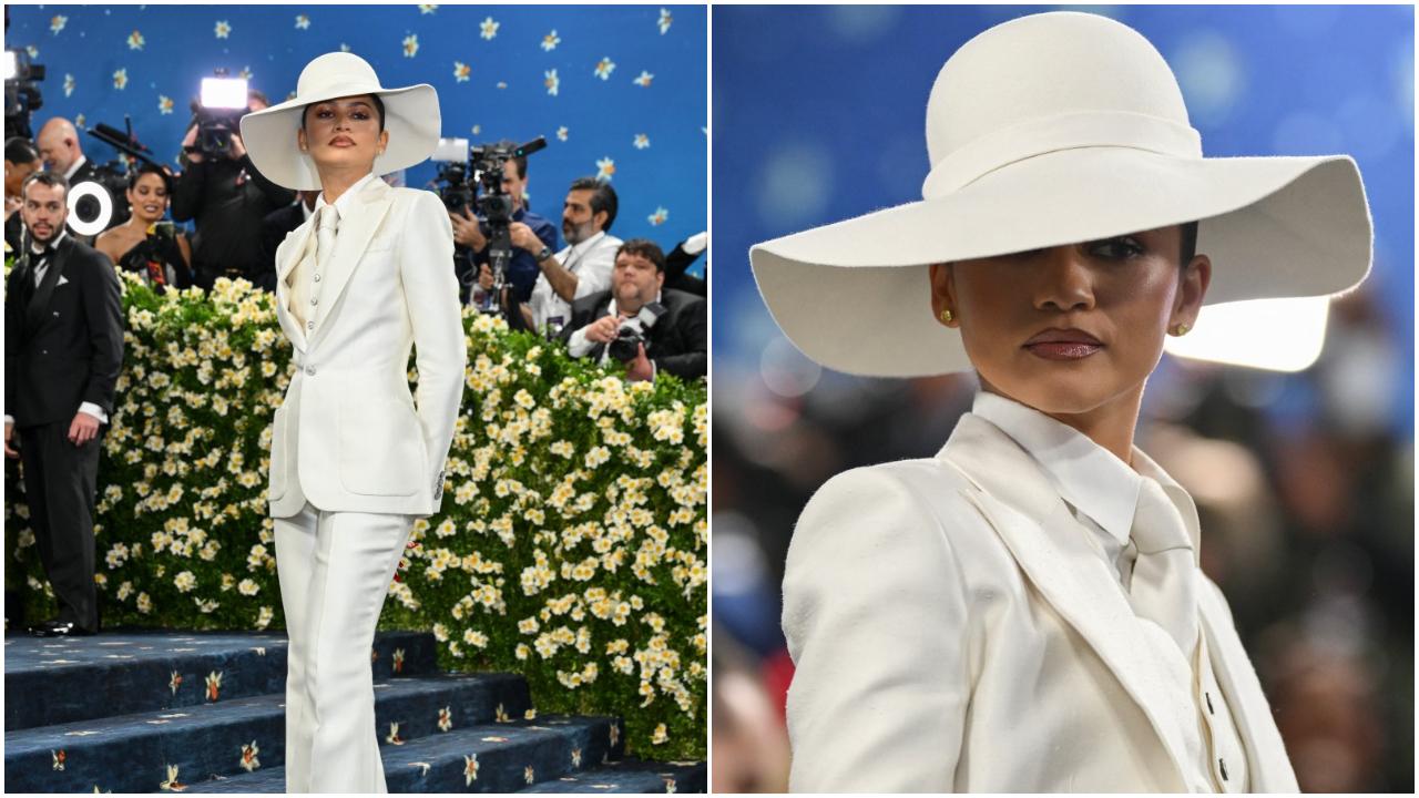 Zendaya
Zendaya always gets the assignment right! She aced her Met Gala look yet again with a custom three-piece all-white Louis Vuitton ensemble, designed by Pharrell Williams. The outfit featured wide-leg trousers, vest and a fitted blazer. The look was elevated with a tie and floppy hat. She opted for minimal accessories and her hair were styled in a sleek bun, further driving focus on the outfit