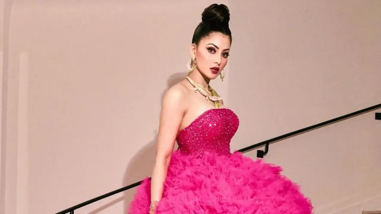 Urvashi Rautela, 2023
Keeping Urvashi Rautela’s dramatic Barbie-core pink ruffled gown aside, there was another reason this look came in the spotlight in the 2023 edition of Cannes. It was because of the bizarre statement reptile neckpiece, featuring two intertwined crocodiles. The earrings also featured the same design, and netizens were quick to make memes on the accessory