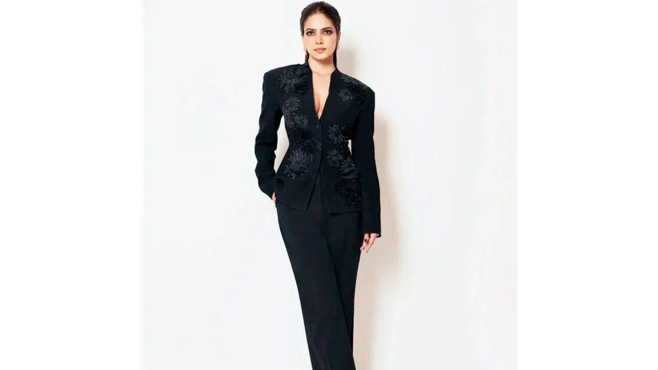 Malavika Mohanan sports a suit with a fit-to-flare silhouette
Focus on fit
Much of a suit’s impact lies in its fit, and tailoring can make or break a look. Mehta offers a few simple guidelines — in terms of your jacket, a slim fit with slight ease around the waist is the most flattering. The length should hit right at the hips or slightly below: a shorter length detracts from the power edge of the look. In terms of your trousers, a fit-to-flare silhouette is flattering and dynamic. The hem should sit just an inch above the floor.  Wear heels to elongate your legs and amplify presence