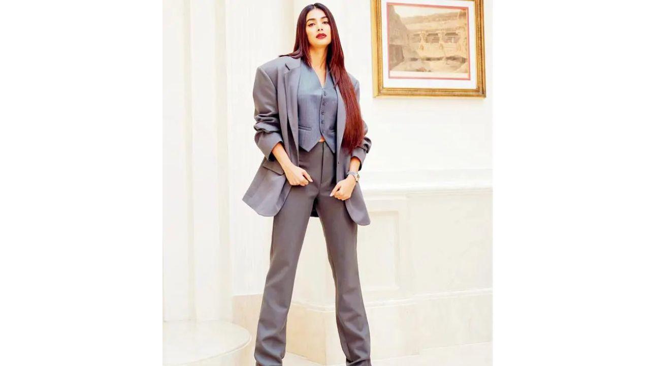 Pooja Hegde’s muted grey suit combines style and substance (Photo Courtesy: Instagram/Tanya Ghavri)
Don’t wear pure cotton or linen
For a suit to survive an Indian summer, it has to keep you cool without compromising on structure. And this can be achieved with fabrics that have a good fall and are lightweight. Mehta suggests lightweight wools, crepes, linen blends (with viscose or wool), seersucker and fabrics with a slight stretch. “Avoid 100 per cent cotton or linen suits: although breathable, they wrinkle fast and lose the suit’s sleek, powerful silhouette. The fall of these materials is also stiffer,” she elaborates