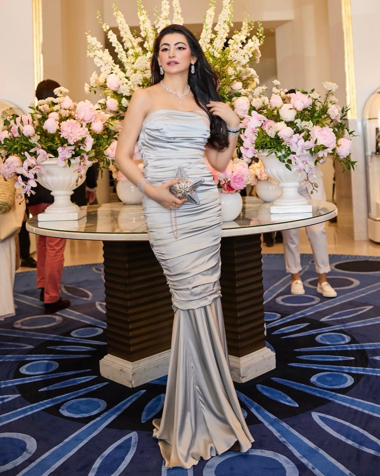 She wore this custom Dolce & Gabbana gown for the Cinema Italiano dinner hosted by Dolce & Gabbana at Copal Beach, Cannes—an exclusive seaside event celebrating cinema, glamour, and timeless elegance