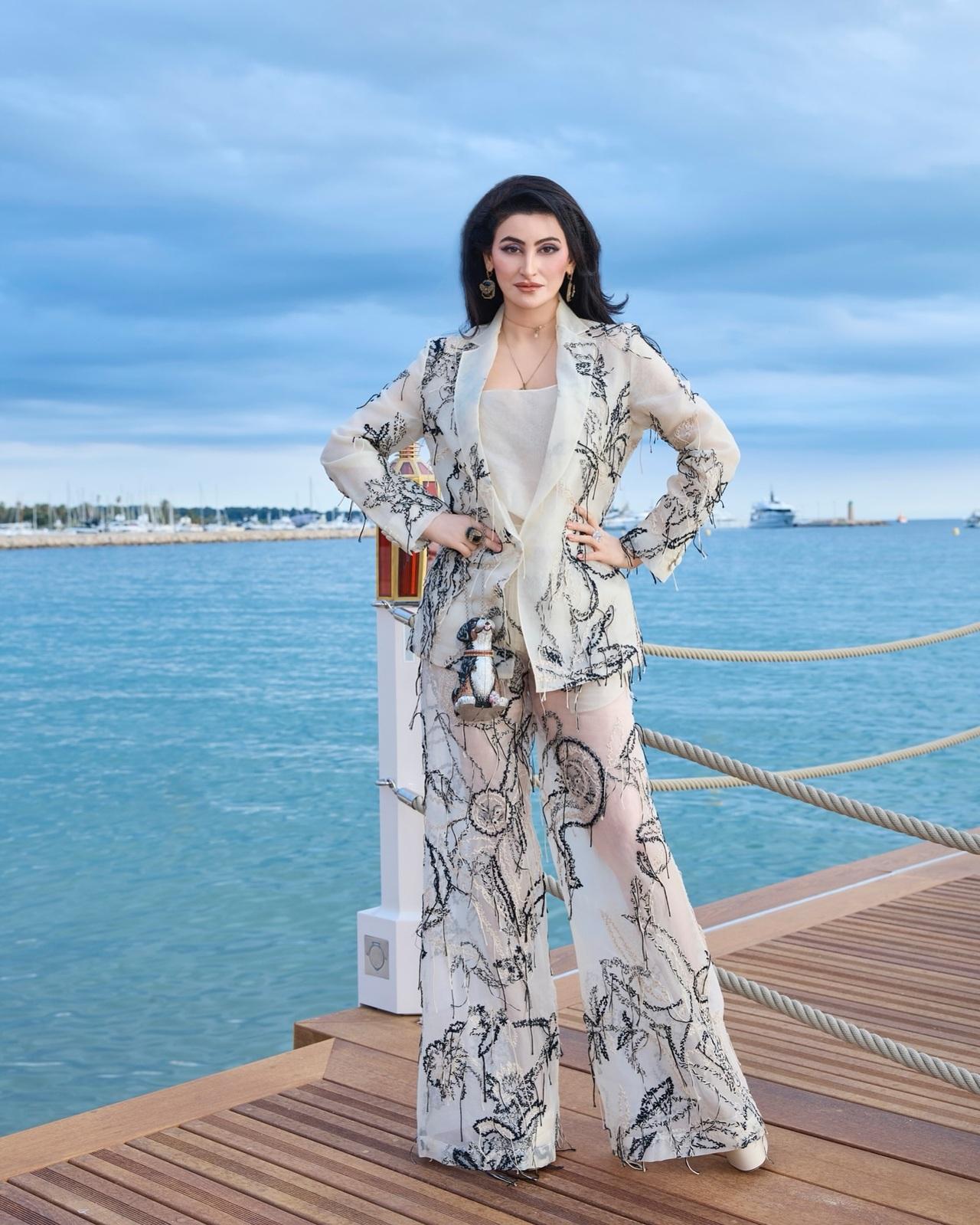 Shalini wore a sheer pant suit from her personal wardrobe, the Jade suit by Monica Shah featuring intricate embroidery inspired by nature’s motifs. Handcrafted with Kantha embroidery in Kolkata, the outfit beautifully showcased generations of artistry and celebrated cultural heritage through exquisite craftsmanship