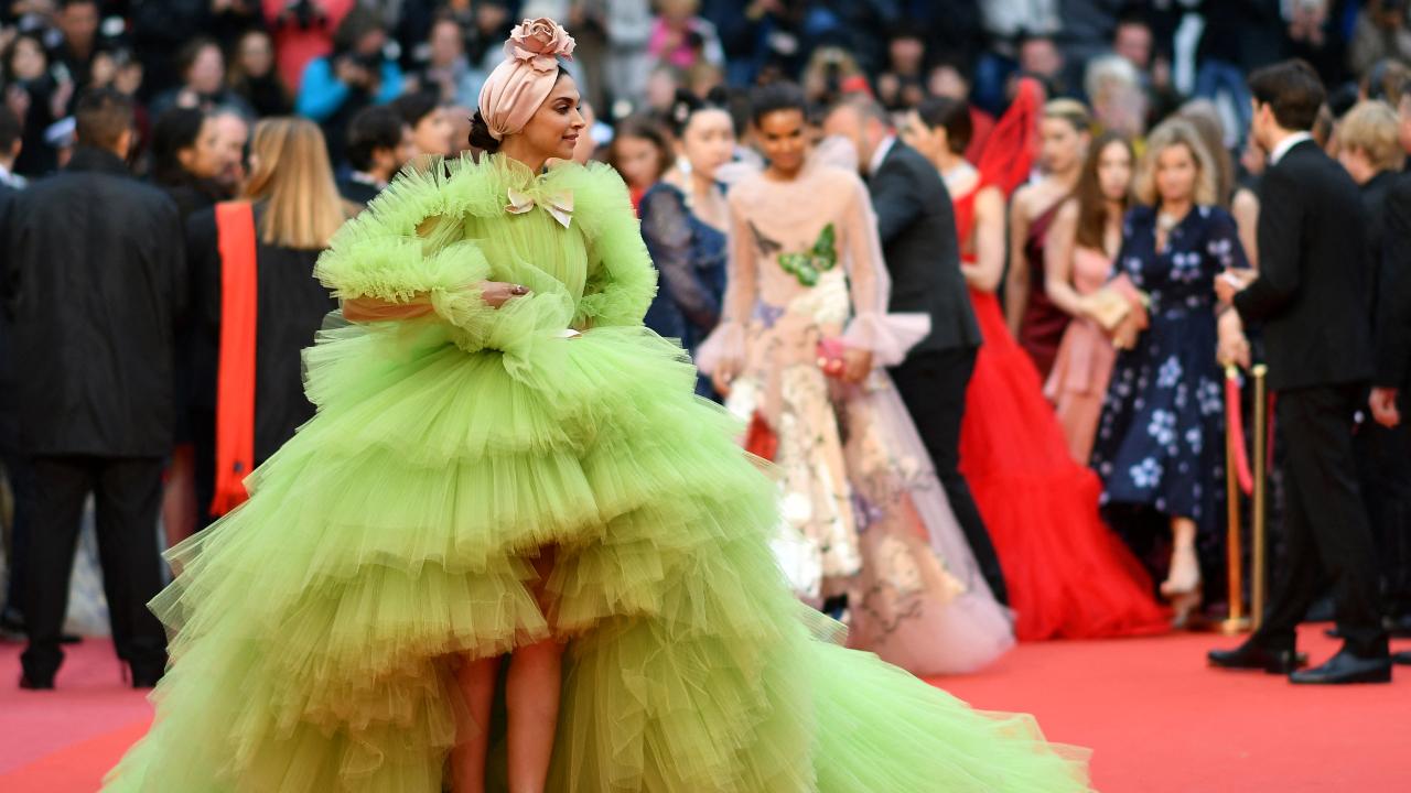 Deepika Padukone, 2019
Deepika Padukone’s over-the-top lime green gown at Cannes 2019 may not exactly be bizarre but it sure caught everyone's attention and drew mixed reactions, especially because it was more ‘Met Gala’ than ‘Cannes’. While the ensemble was largely appreciated, some people called it weird because of its colour and volume
