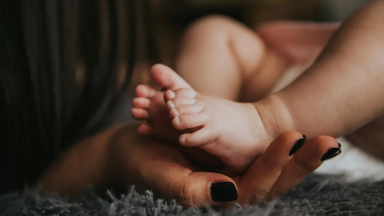 Mom-child moments
To reflect this beautiful bond, you can freeze special mother-child moments as tattoos. For example, a mom holding her baby, or a mother’s hand holding her child’s hand
