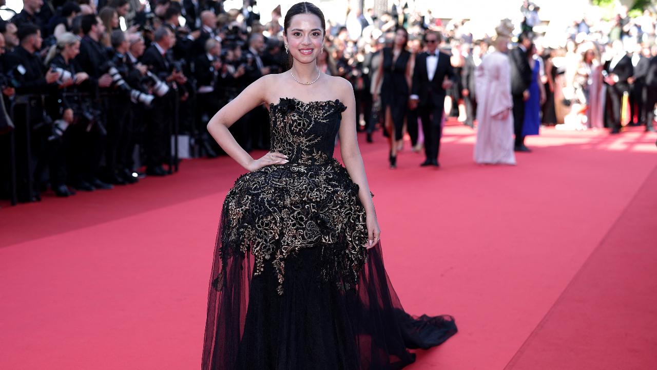 Nitanshi Goel
Nitanshi Goel looked radiant as she walked the Cannes red carpet in a black gown by the label JADE by Monica and Karishma. The outfit featured kasab embroidery and macrame detailing, highlighting Indian craftsmanship