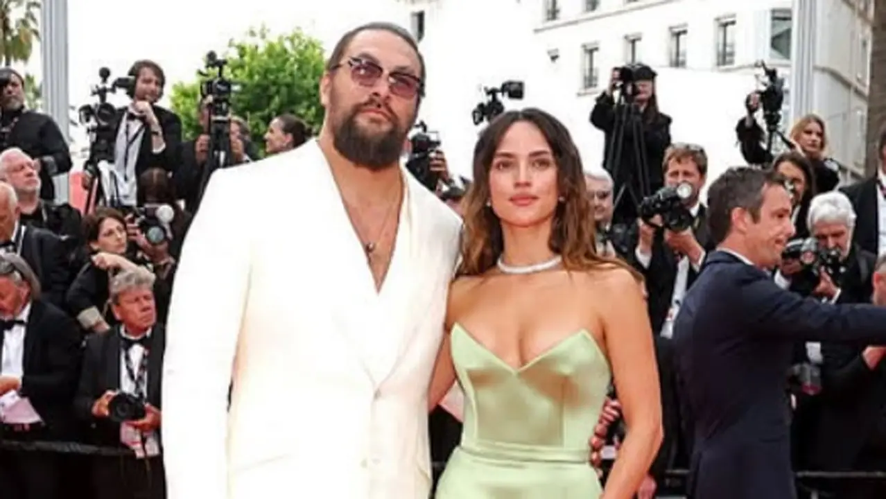 Jason Momoa brings major boyfriend energy at Cannes premiere with Adria Arjona