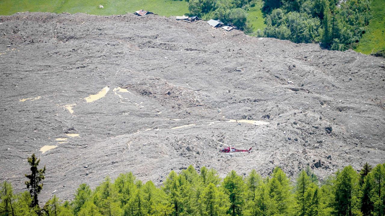 Swiss glacier collapse sends rock and ice crashing into Alpine village
