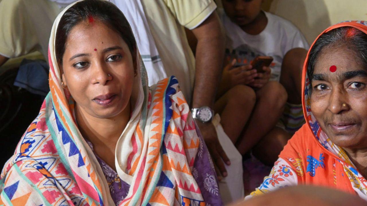 BSF jawan Purnam Kumar Shaw's wife, left, and mother express their relief after hearing the news of his release from Pakistan's custody, at their residence in Rishra, Hooghly, West Bengal