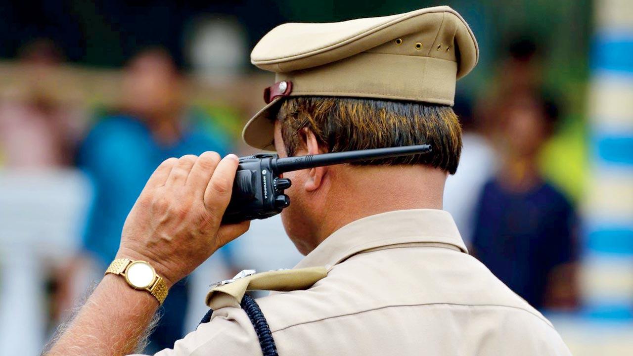 Cop talking on wireless. Represenation pics/iStock