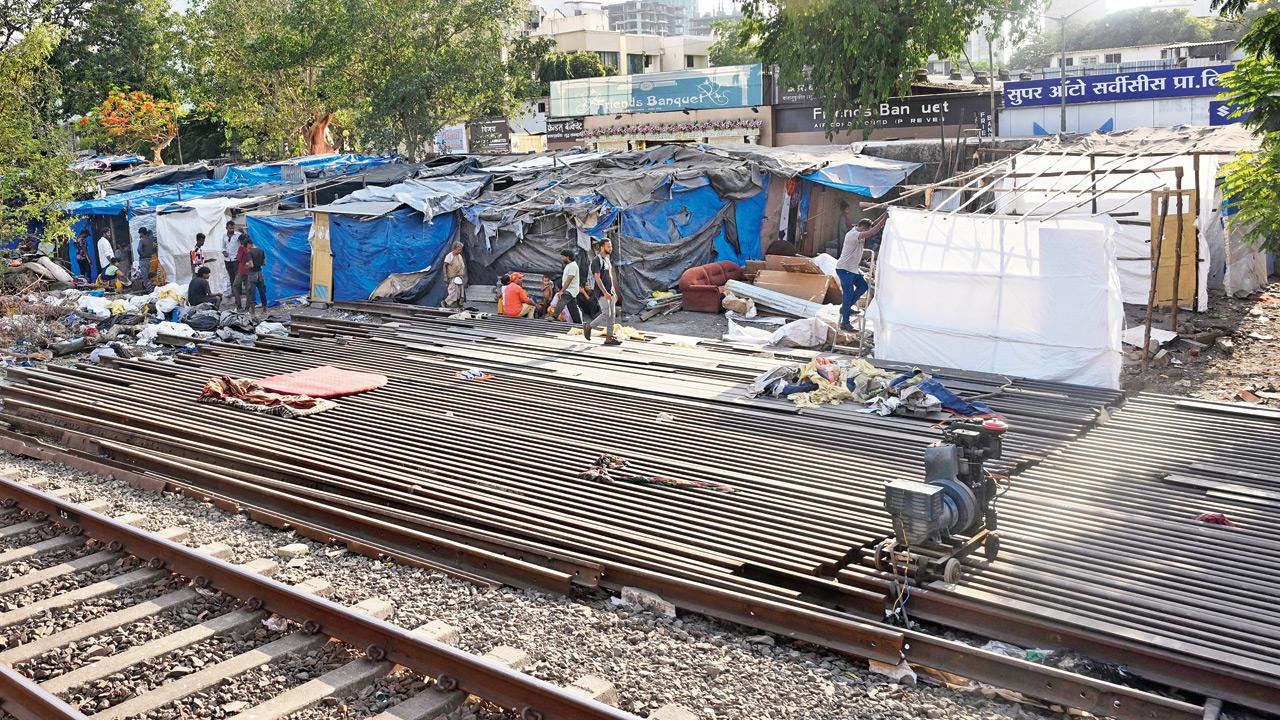 Structures are set up on railway land opposite Rustomjee International School on Jaywant Sawant Road on May 1. Pics/Satej Shinde