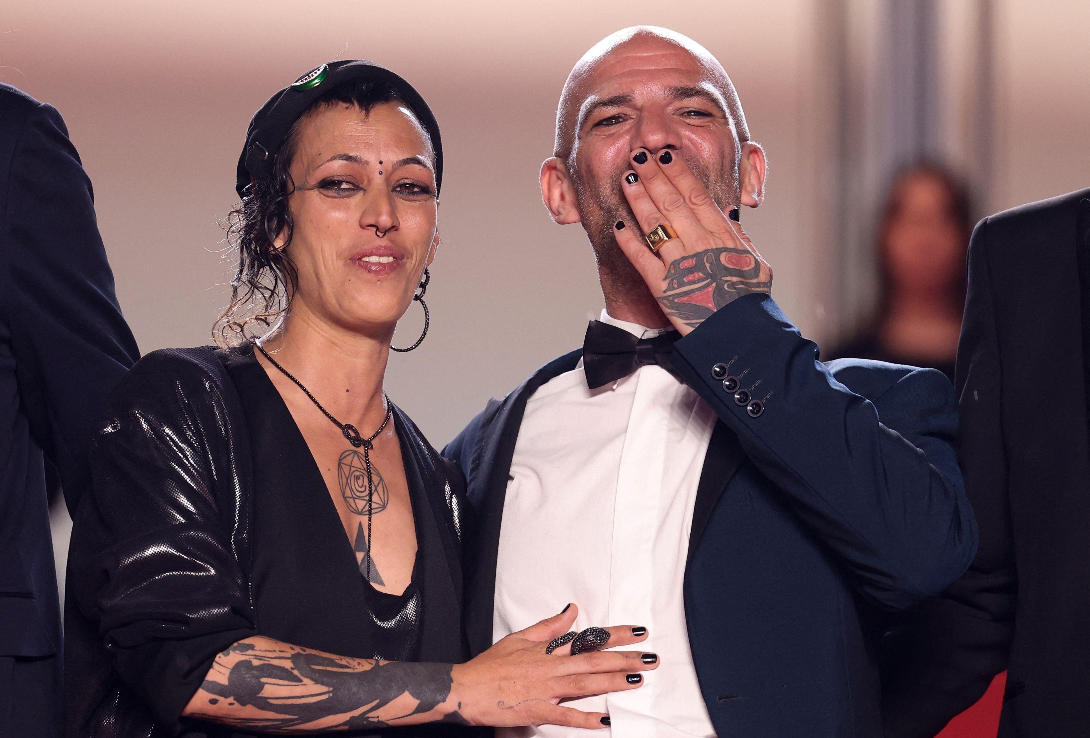 French actress Jade Oukid and French actor Richard Bellamy were spotted together on the red carpet on Day 3 of the Cannes Film Festival. The duo caught attention with outfits featuring a playful watermelon logo