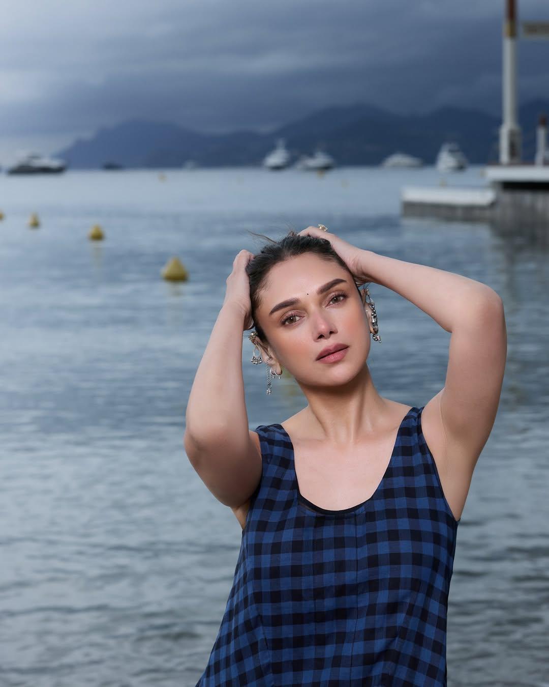 As she wrapped up her Cannes trip, Aditi shared a final series of photos in a stunning blue outfit while enjoying time by the sea. She revealed that despite challenges and a stormy day, she chose joy and spontaneity