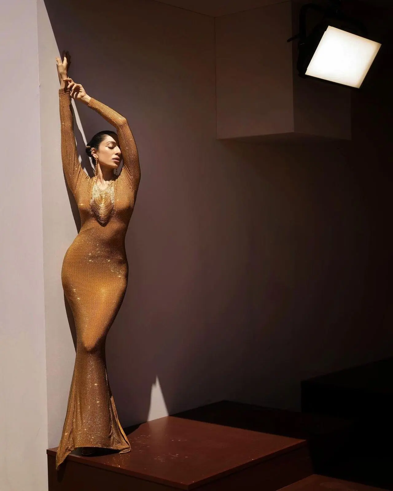 Sobhita Dhulipala turned heads at Cannes 2024 in a stunning gold crystal-embellished gown by Indian label ITRH. Designed by Ridhi Bansal and Mohit Rai, the body-hugging outfit featured a plunging neckline and elegant drapes