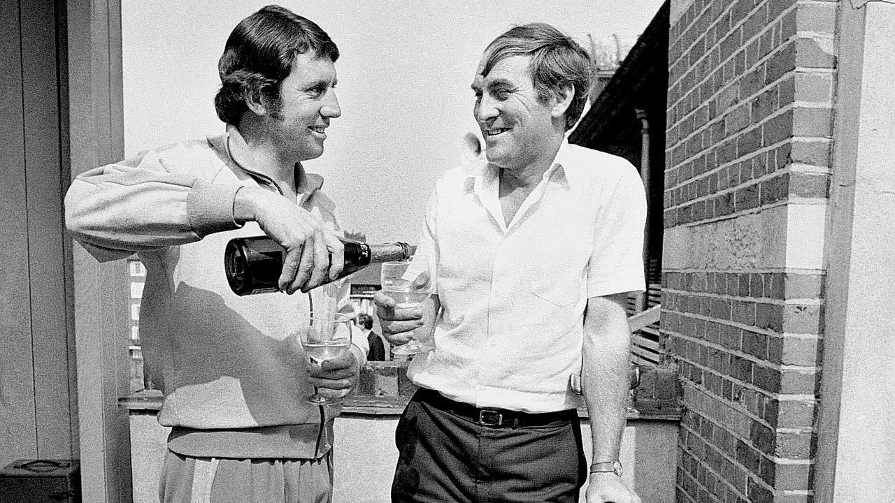 Chappell (left) and Illingworth raise a toast at the end of the Ashes series in 1972. Pic/Getty Images
