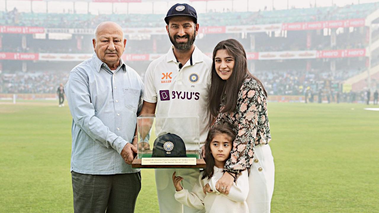 Cheteshwar is joined on the field by Puja and their daughter Aditi as he wins his Hundredth Test cap in 2023