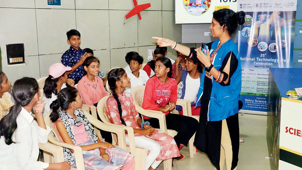 Children interact with an instructor during last year’s National Technology Day celebrations. Pic courtesy/Jitendra Radke