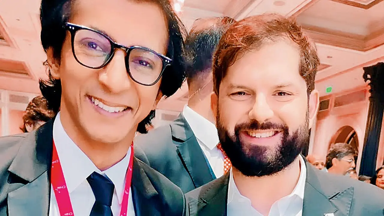 (From left) Anshuman Jha and President Gabriel Boric Font
