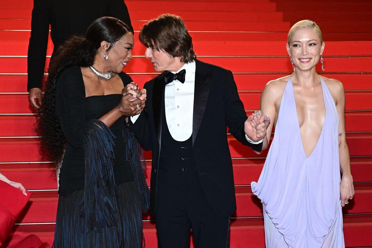Soon after the screening of Mission: Impossible, Tom Cruise walked out of the venue with two beauties, Angela Bassett and French actress Pom Klementieff. The trio was seen smiling brightly, while Tom and Angela were busy chit-chatting with each other