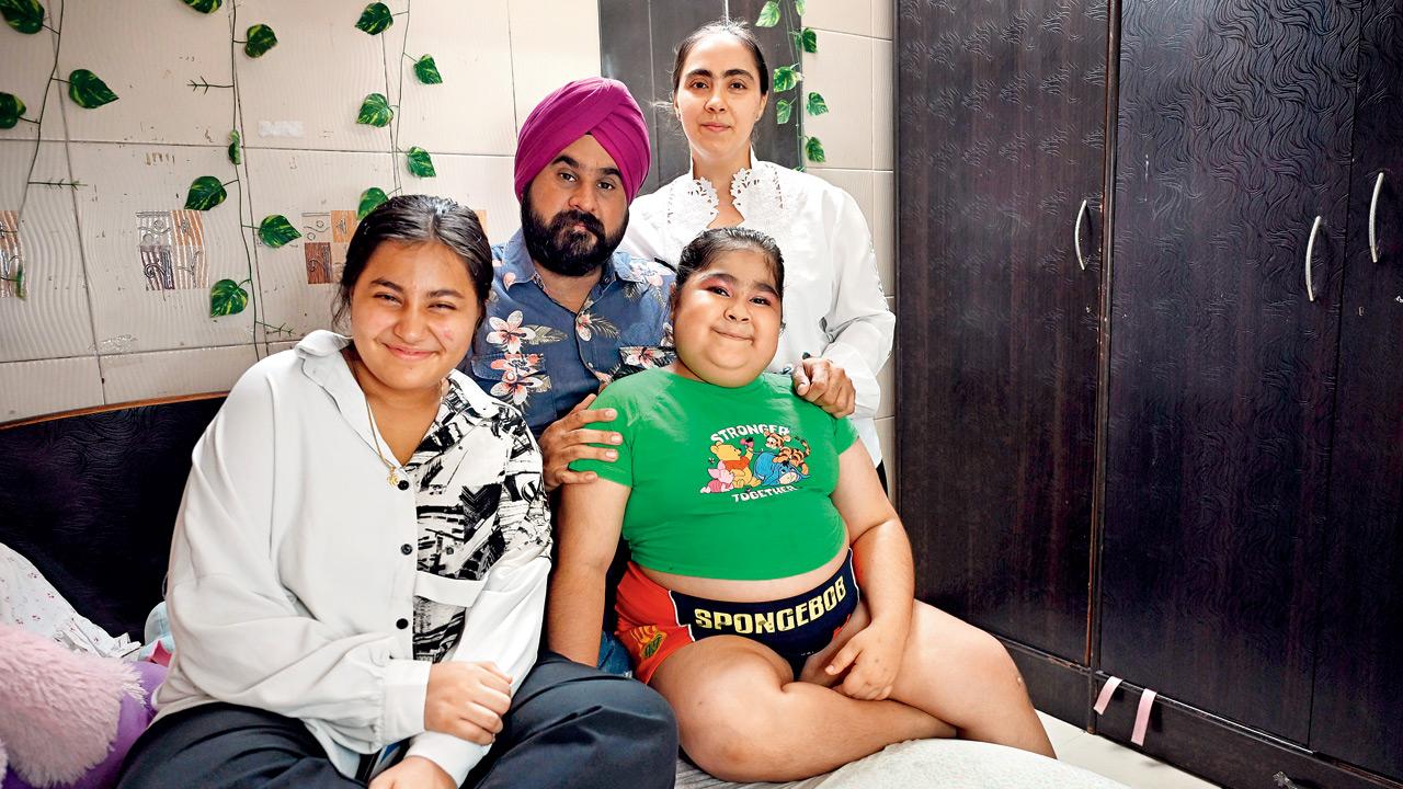 Gunit with her elder sister Anit (l), and parents Jasmeet Singh Banga and mother Chanpreet Banga